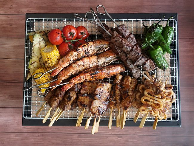 Grilled Meat and Sizzling Sticks